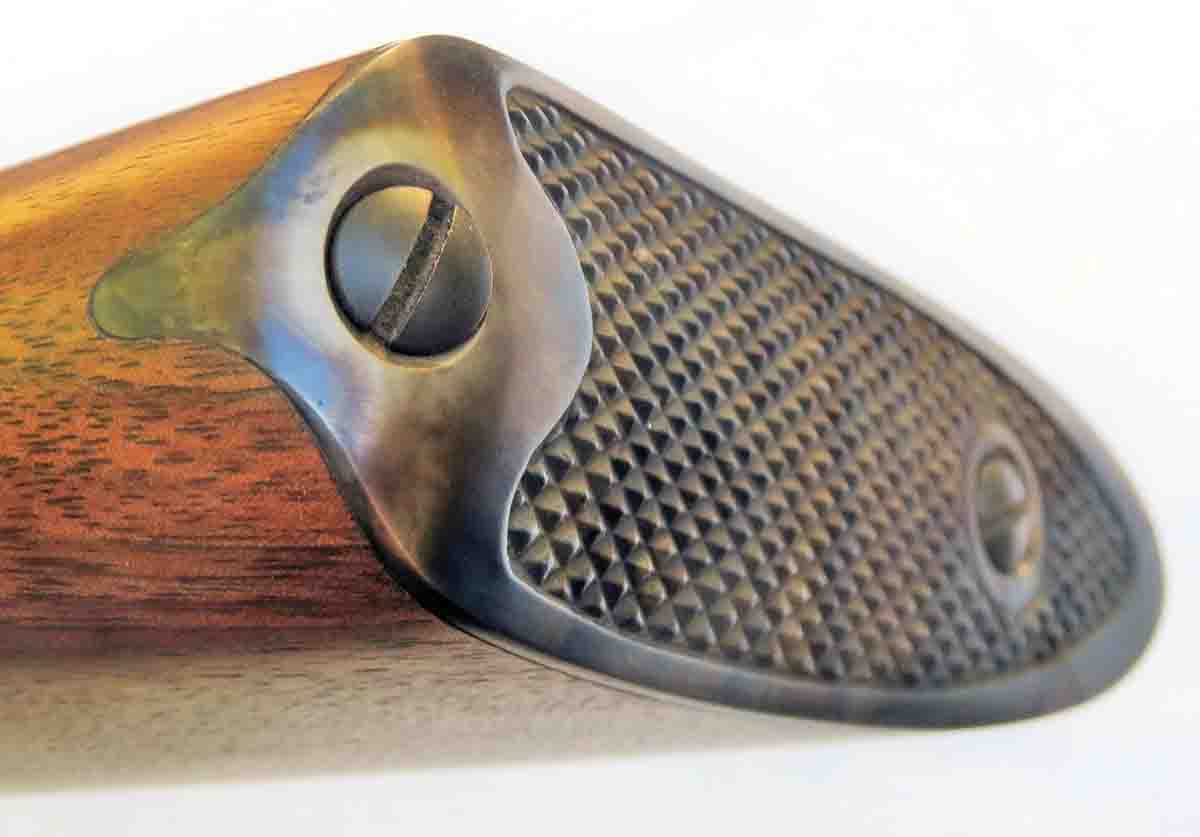 Excellent wood-to-metal fit on the 1877 Sharps Bridgeport-style casehardened buttplate.